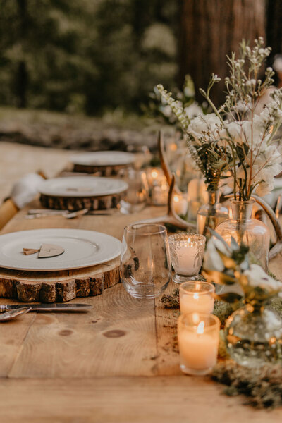 wedding table setting in forest