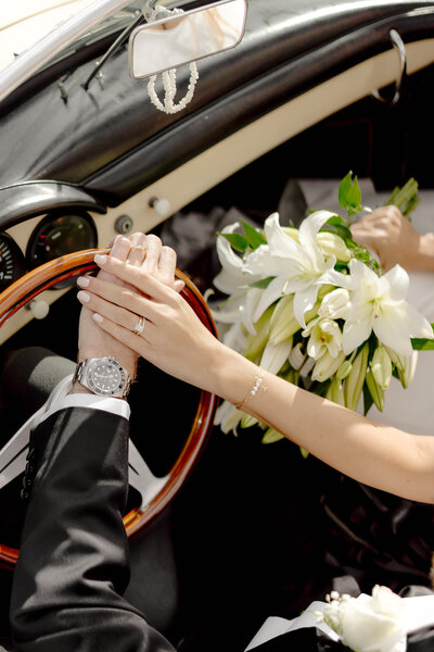 Bride and Groom pictures in a vintage car on their wedding day at the Marbella Golf Course