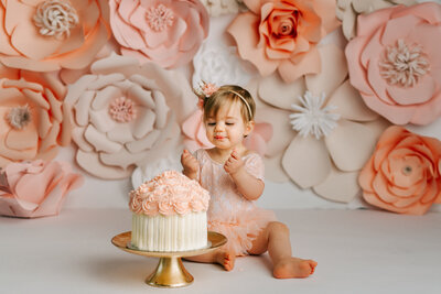 cake smash with floral backdrop
