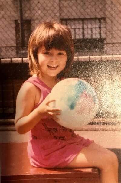 Childhood photo of Jeannine, showing her early connection with nature and exploration, reflecting her passion for nature-based learning at Brave Nature School.