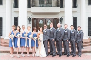 wedding party in front of Ryan Nicholas Inn