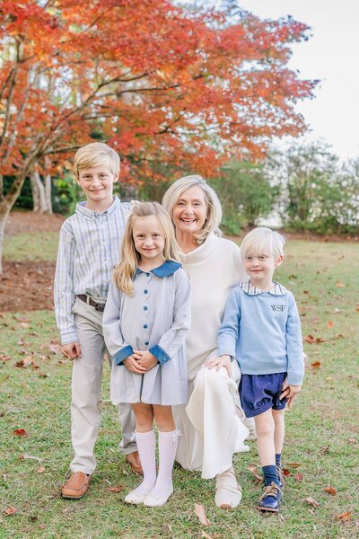 children posing with grandmother at Lake Martin family session