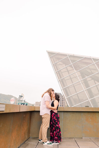 Romantic engagement proposal in Roanoke, VA, in the city at sunset, filled with love