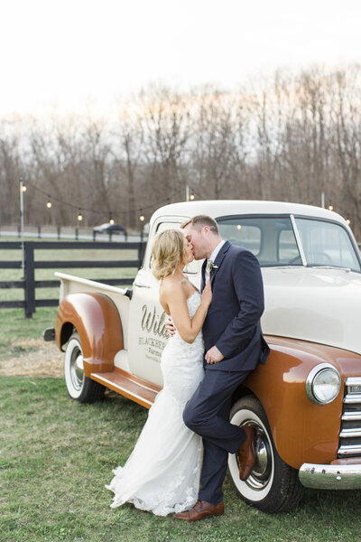 bride and groom with truck, Wild Blackberry Farm Fortville wedding