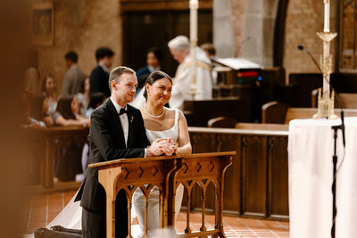 a groom smiling at his bride