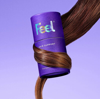 Feel Hair Support Supplement to promote stronger, healthier hair through midlife.