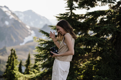 photo of girl wearing a hat looking back over her shoulder