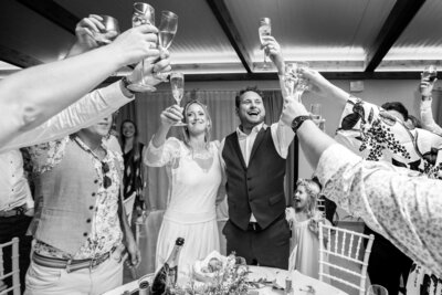 Bride and groom toasting