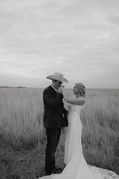cowhide aisle at ranch wedding ceremony