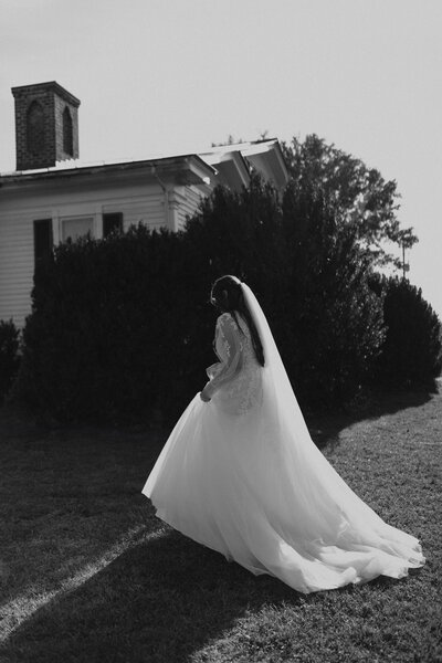 bride walking in dress