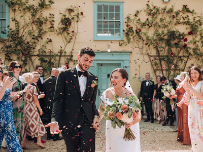 Bride and groom first look photos in field