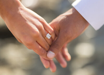 engagement photo hand holding showing engagement ring