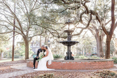 "A stunning bridal portrait taken beneath the iconic live oaks of Wormsloe, capturing elegance and natural beauty."