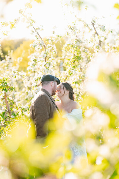 Red Apple Farm wedding photos featuring rustic orchard views and romantic New England charm.