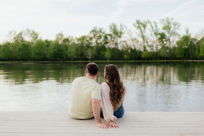 a bride and groom dancing at their wedding reception with colorful lights photographed by alabama and washington wedding photographer sarah mismash