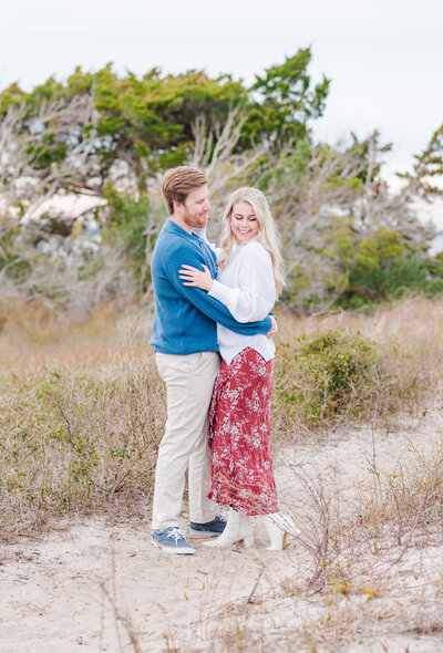 Engagement session of a couple at the beach.