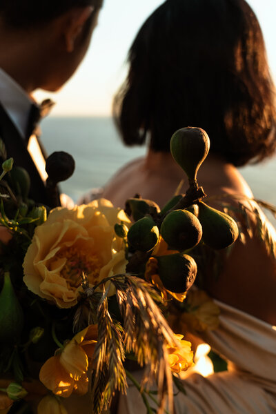 Unique wedding bouquet with fruit design component on the Oregon Coast