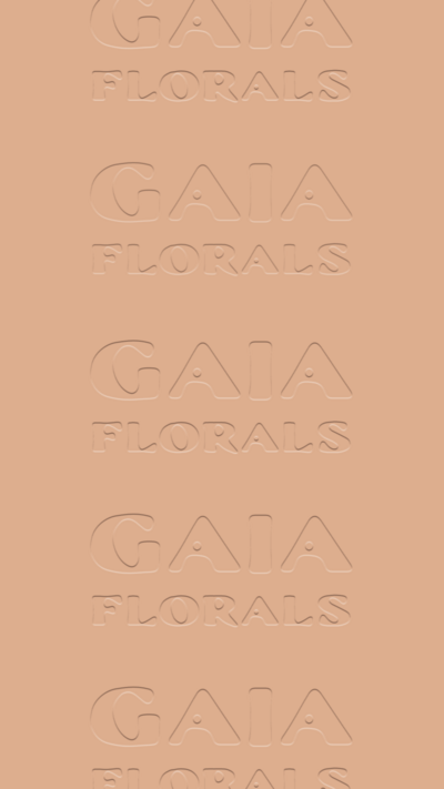 Mockup of debossed Gaia Florals logos on a pink background