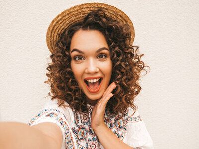 beautiful-smiling-model-with-afro-curls-hairstyle-dressed-summer-hipster-white-dress_158538-767