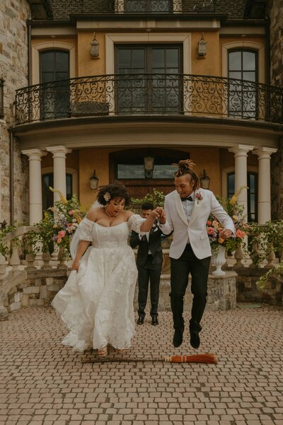 Jumping the broom at Chateau de harpe