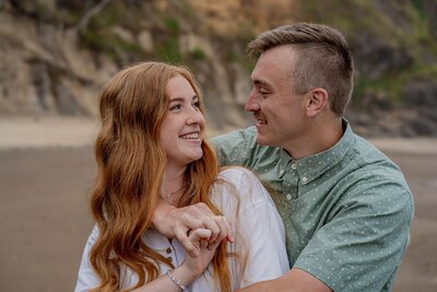 Couple enjoying their beach session