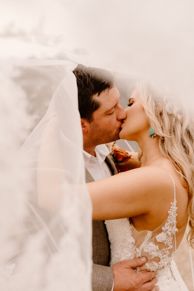 bride and groom kissing