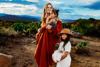 Scottsdale family photographer capturing vibrant mom and daughters during golden hour desert session