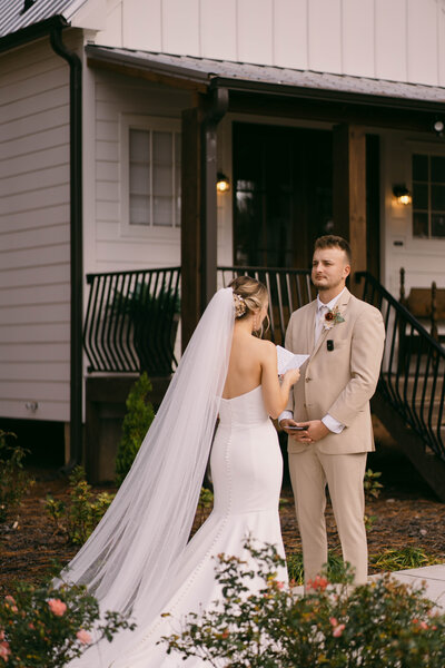Bride and groom first look in a charming NC backyard wedding