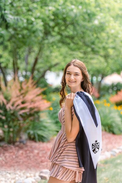 Portrait of a 2020 Fenwick High School senior holding up her tassel by Oak Park, IL senior photographer Kristen Hazelton