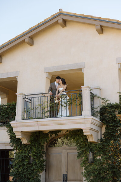 Photo of a wedding dress hanging at a villa in Paso Robles during a Paso Robles winery weding