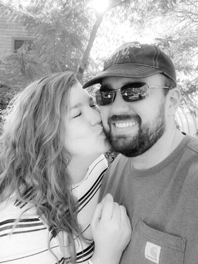 Hope kissing her husband.