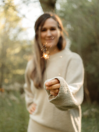 Jasmin smiling in workout clothes