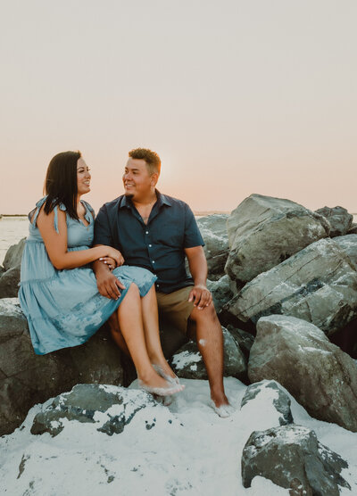 young married couple enjoying sunset on destin florida beach