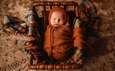 Infant posed for Newborn Photos in in Asheville, NC.