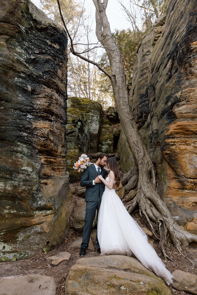 Couple embracing at Ledges in Cuyahoga Valley National Park.