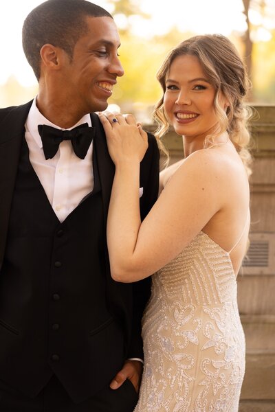 Bride and groom laughing together