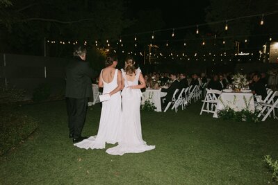 father giving a speech at newlyweds reception