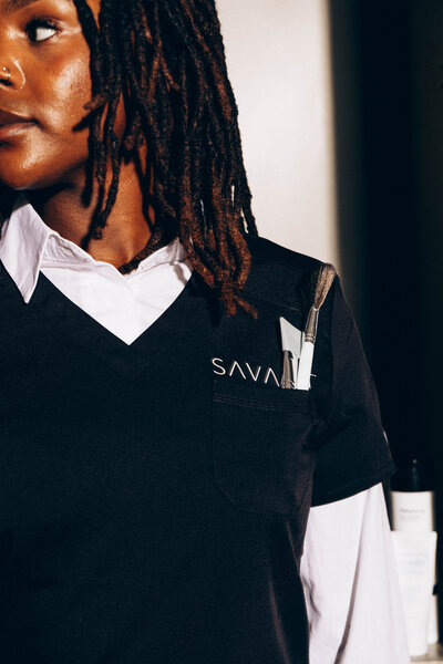 A close-up of an aesthetics student at Savant Aesthetics Institute.