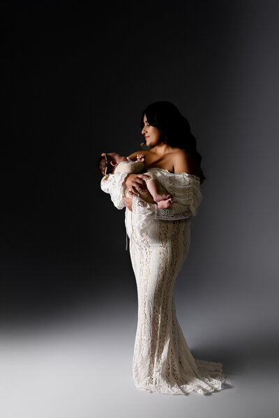 motherhood photographer in dixon, ca. family photographer. milestone portraits. baby girl. mom and baby. gowns. client closet. editorial. motherhood photography