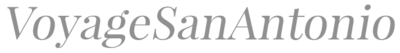 This image is the Voyage San Antonio logo. The logo is a serif font. The image links to a feature about Kylie Jacobsen, a wedding photographer in San Antonio.