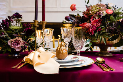 Gothic wedding tablescape with rich jewel tones