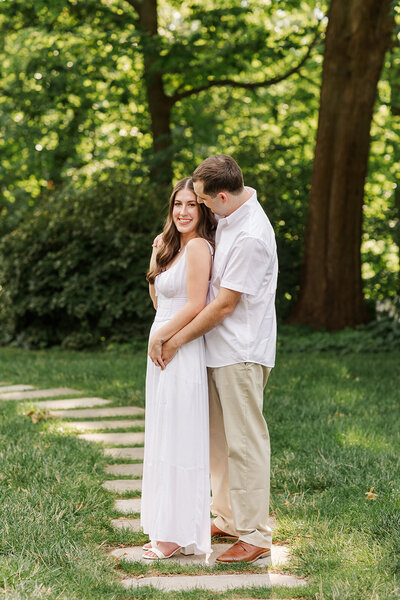 Couple embracing for their outdoor engagement session