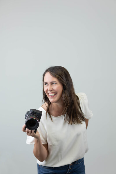 Photographer smiling outdoors