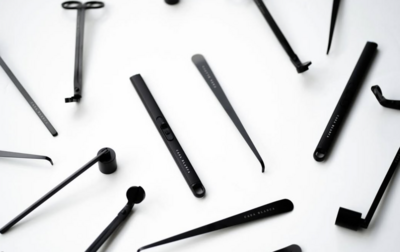 branding candle tools scattered