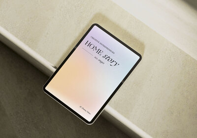 mockup of a tablet device showcasing the home story on a stone background