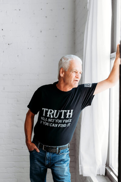 Professional headshot of a man in natural light, photographed in Minneapolis.