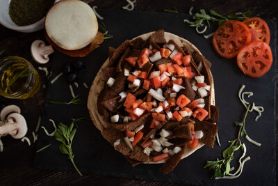 Open-faced donair with seasoned meat, tomatoes, and onions—the Redo’s donair recipe loved in Yarmouth and Wolfville