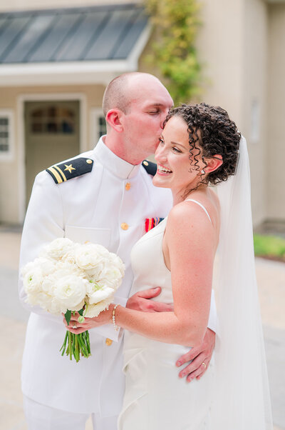 bride and groom hugging