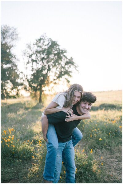 Sacramento Wedding Photographer captures beach wedding of man carrying woman on back