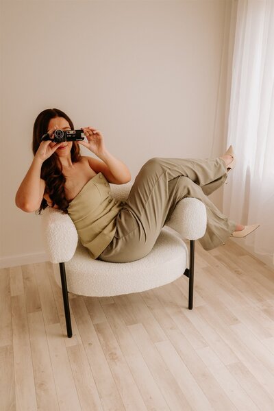 Unmissable Moments founder Hannah with camcorder